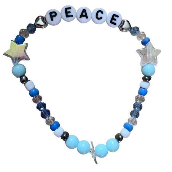 5 for $20 Taylor Swift Handmade Friendship Beaded Bracelet
“Peace” - Picture 2 of 2